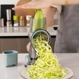 Hand roller vegetable cutter